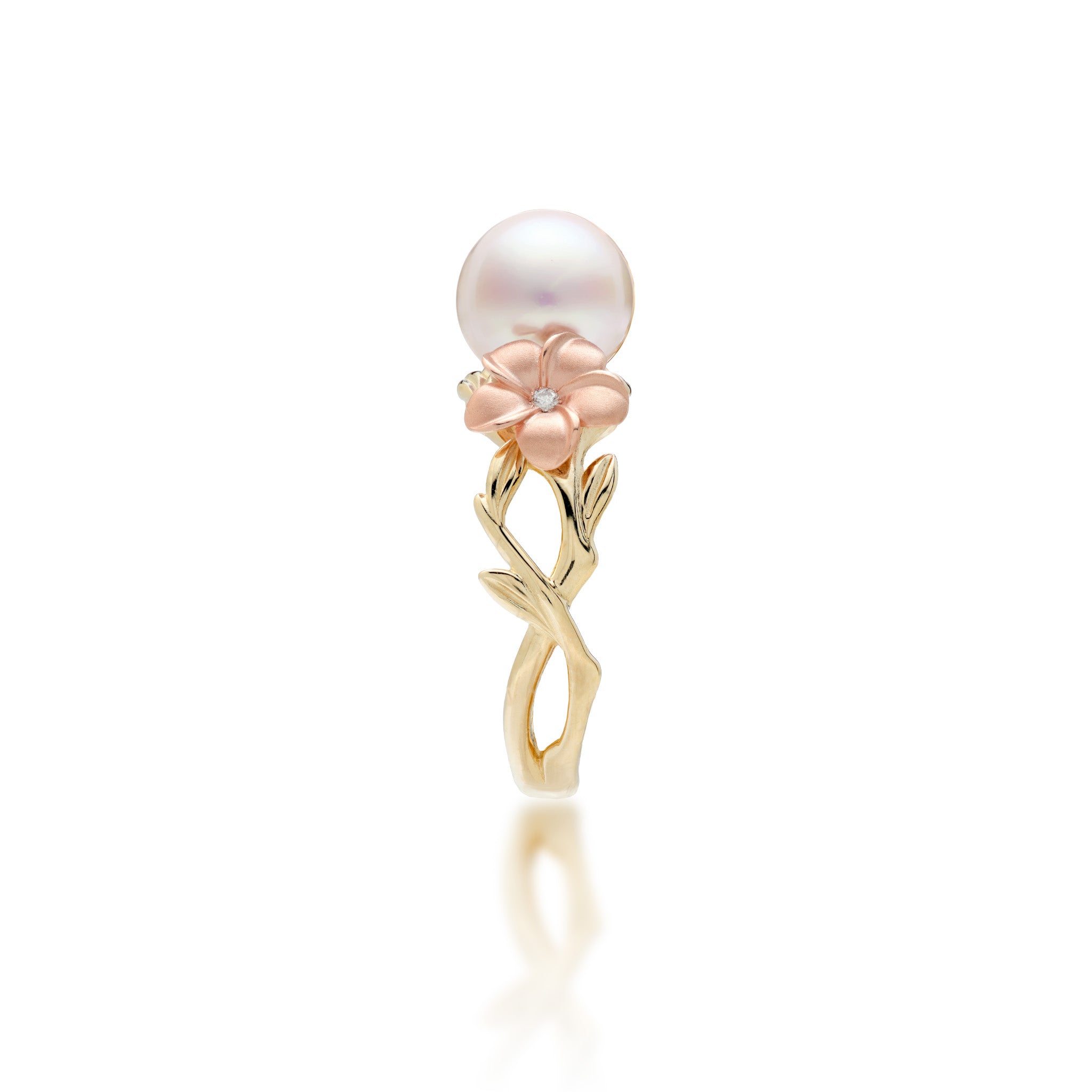 Side view of the Pearls in Bloom Plumeria 8mm Akoya White Pearl Ring in Tri Color Gold with Diamonds on a white background