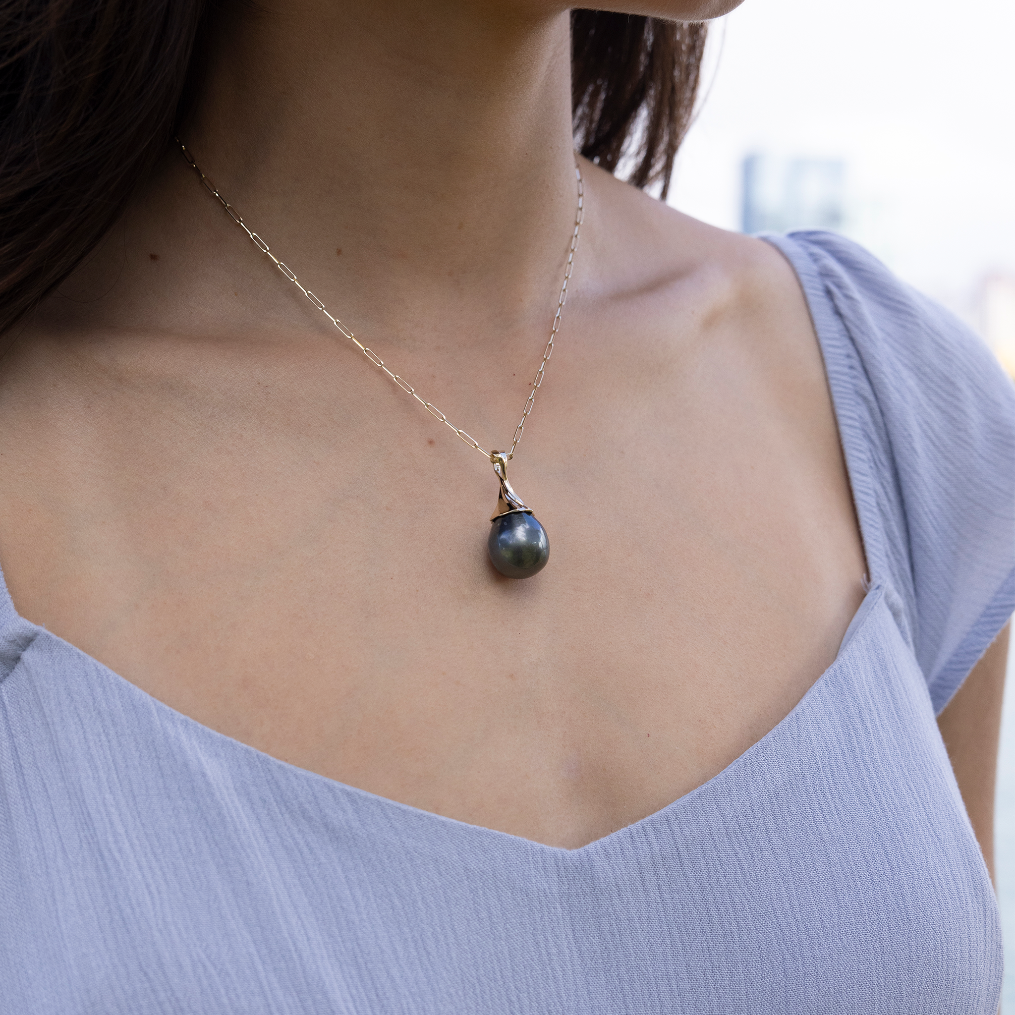 Waterfall Circle 14-17mm Tahitian Black Pearl Pendant in Gold on a woman