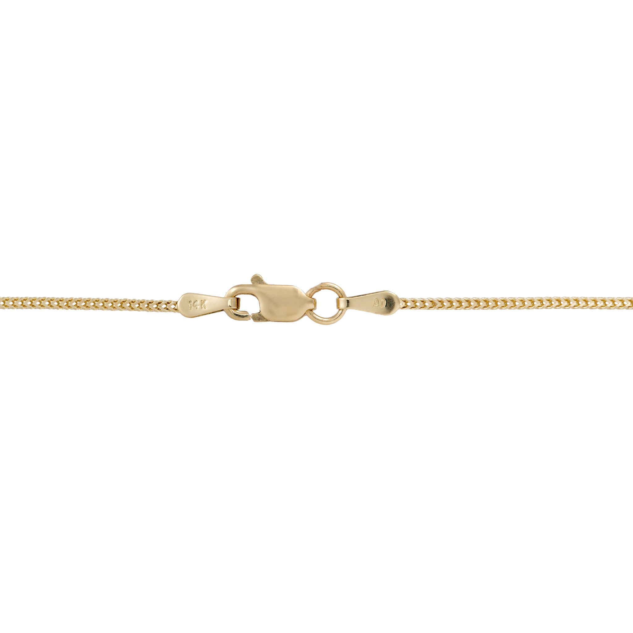 Close up of 14k gold lobster clasp on a white background