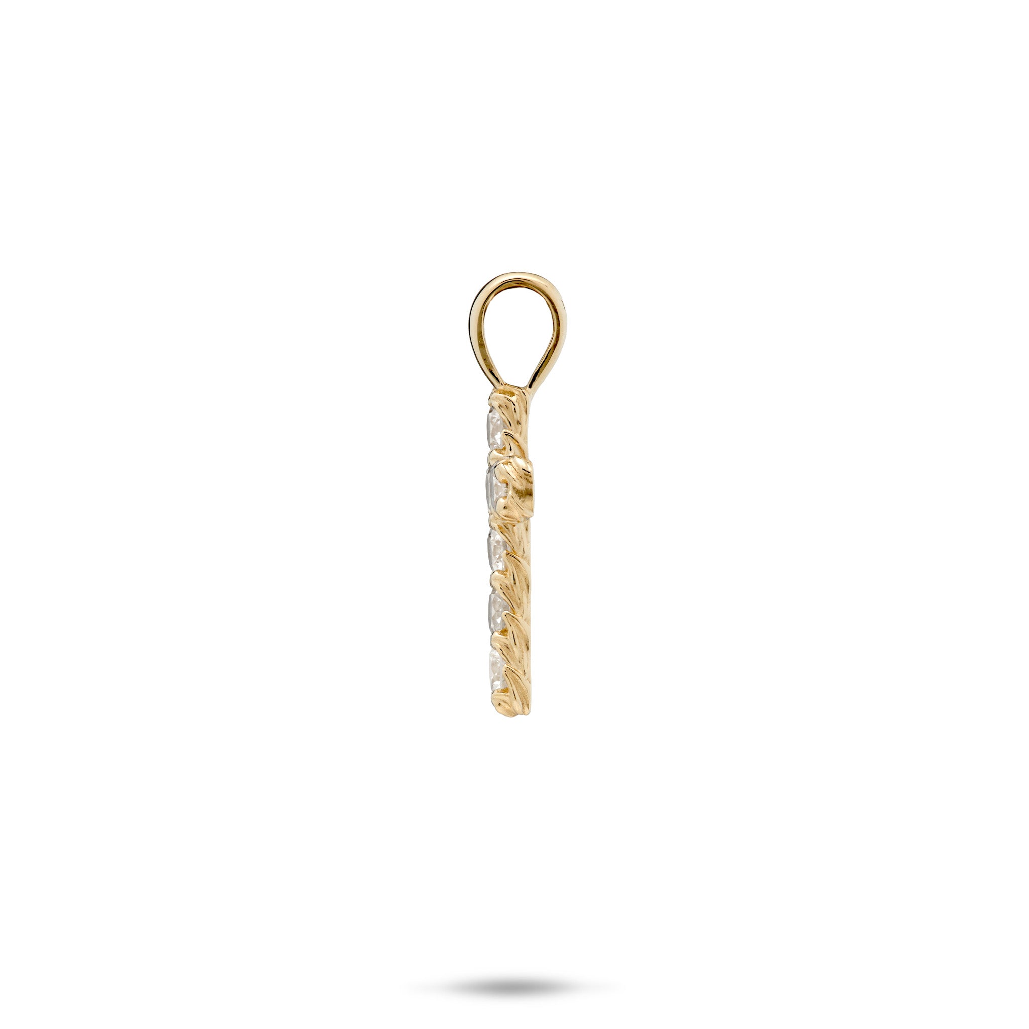 Side view of a Hidden Hawaiʻi Maile Leaf Cross Pendant with Lab Grown Diamonds set in 14k yellow gold on a white background