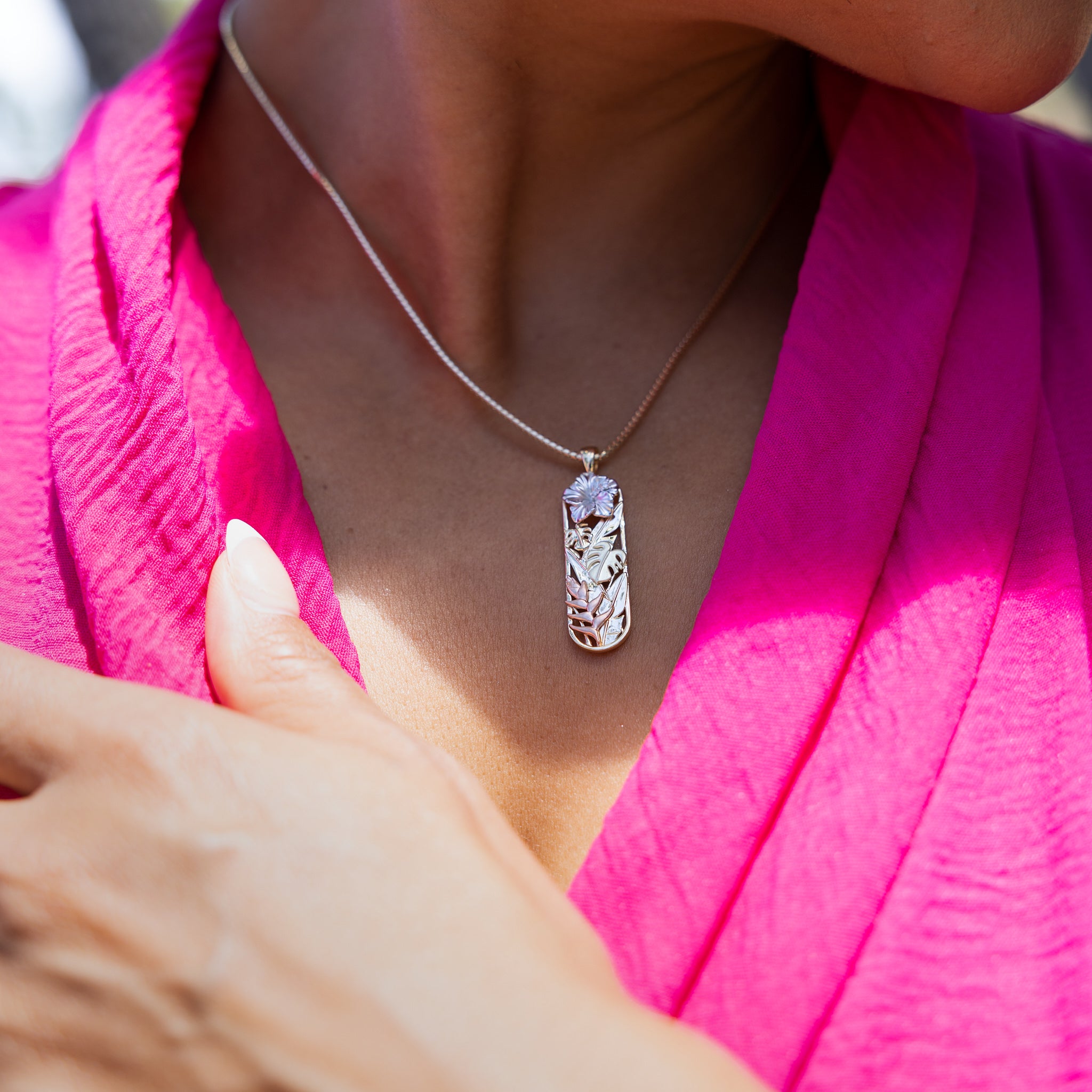 011-01769Hawaiian Gardens Hibiscus Pendant in Multi Color Gold with Diamonds - 32mm on Model - Maui Divers Jewelry