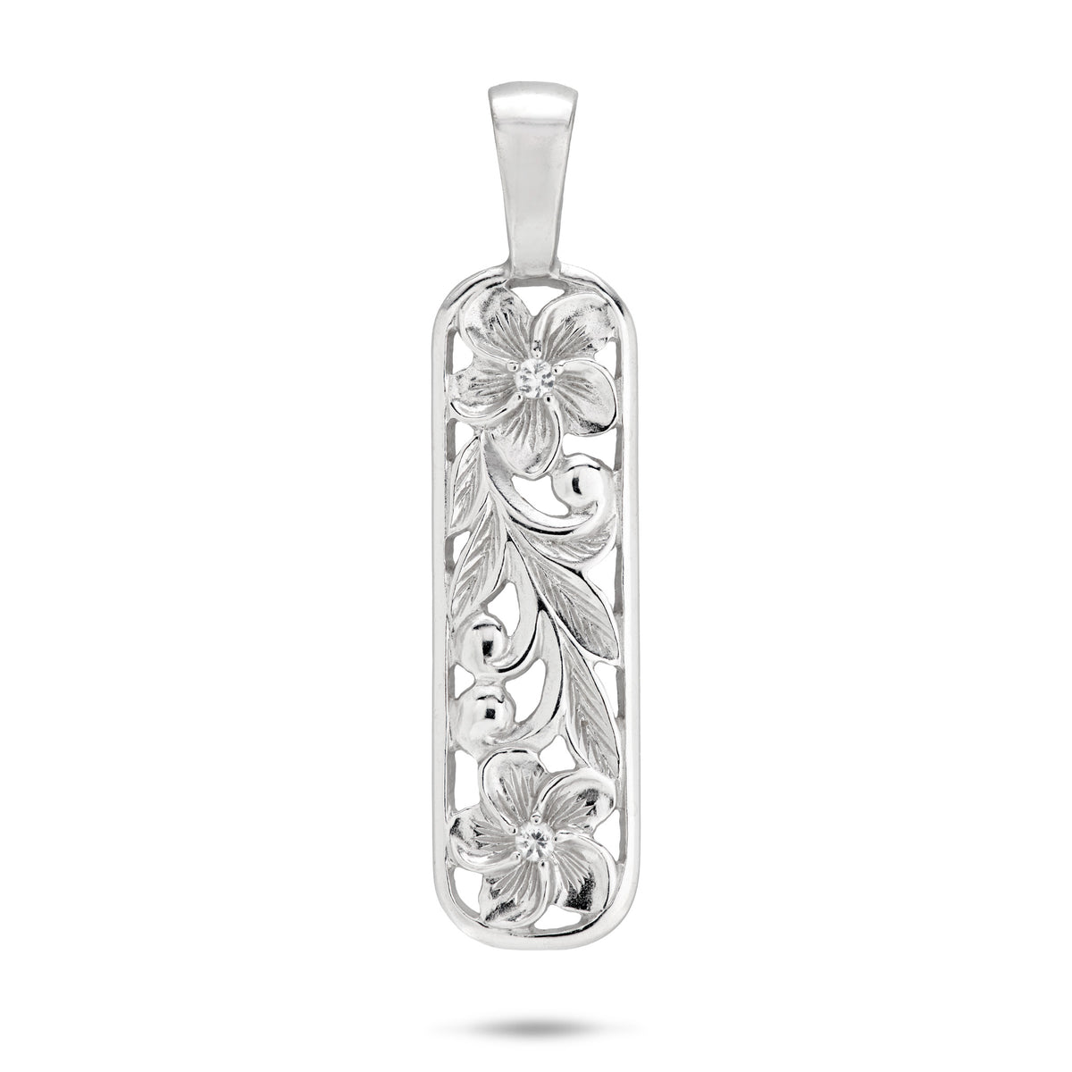 A 32mm Hawaiian Heirloom bar pendant in Sterling Silver, two plumeria flowers with White Sapphires in the center, maile leaves and hapuʻu fern scrolls connecting the flowers, placed on a white background.