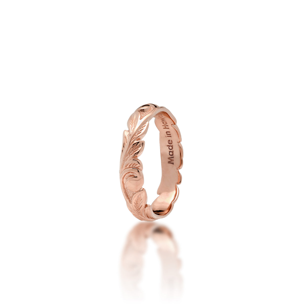 4.5mm Hawaiian Heirloom Ring in 14k Rose Gold with maile leaf and fern scrollwork and ʻMade in Hawaiiʻ stamp, shown on a white background