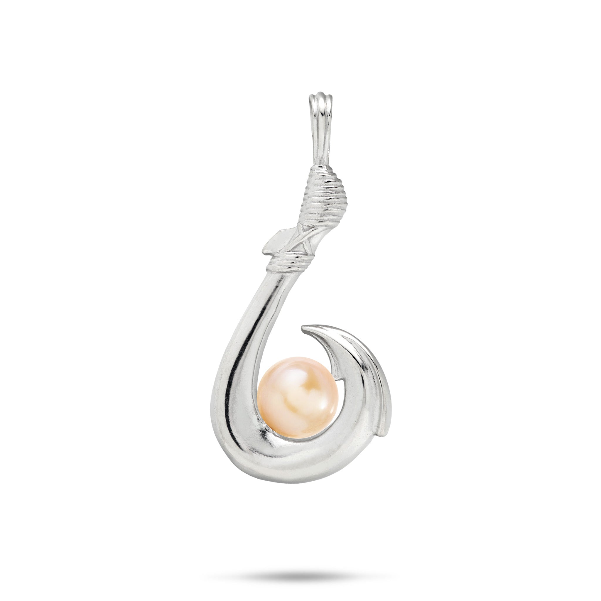 A silver fishhook pendant featuring a single peach freshwater pearl nestled in the bottom curve of the hook, set against a plain white background