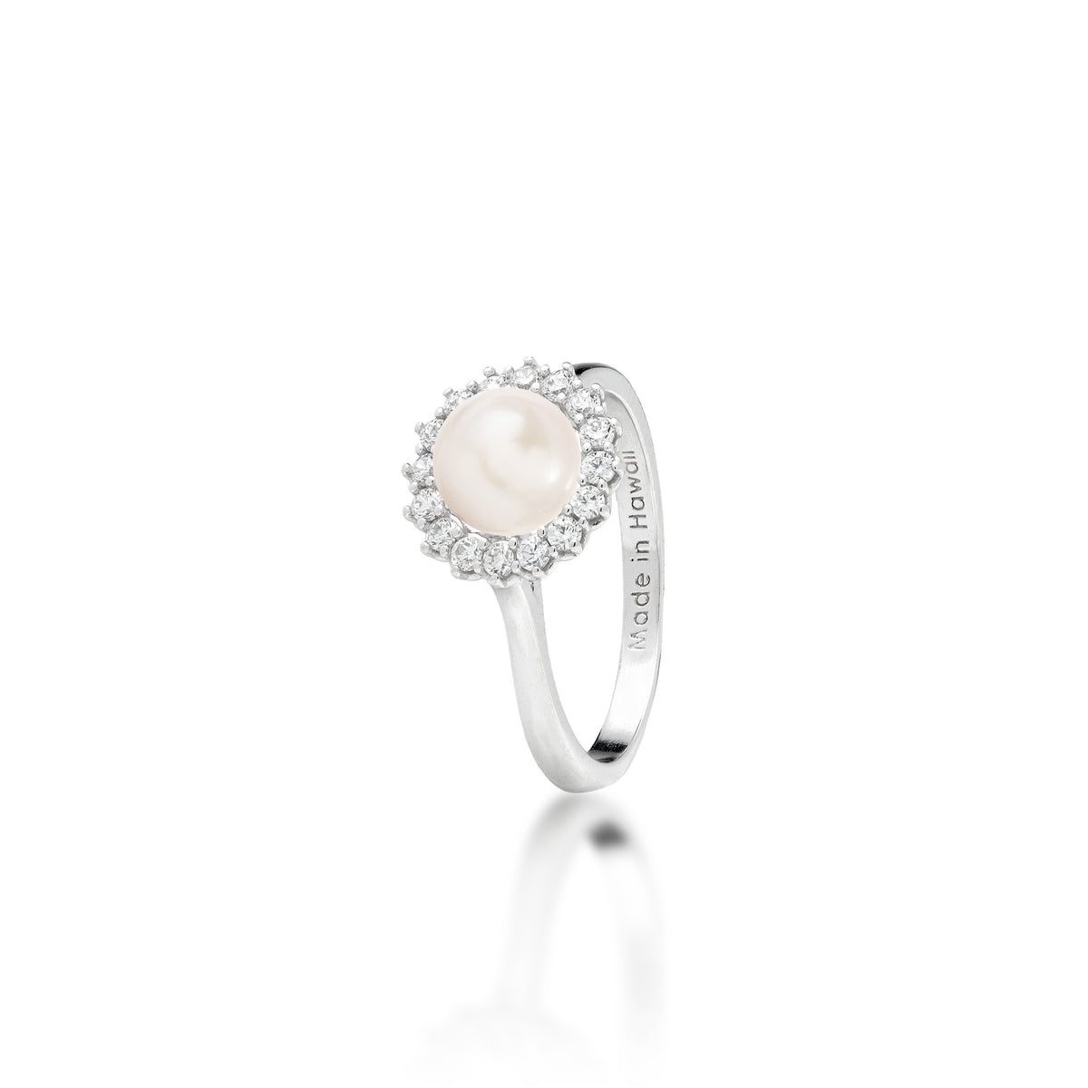 A sterling silver ring with a cubic zirconia halo and white freshwater pearl at the center, shown on a white background