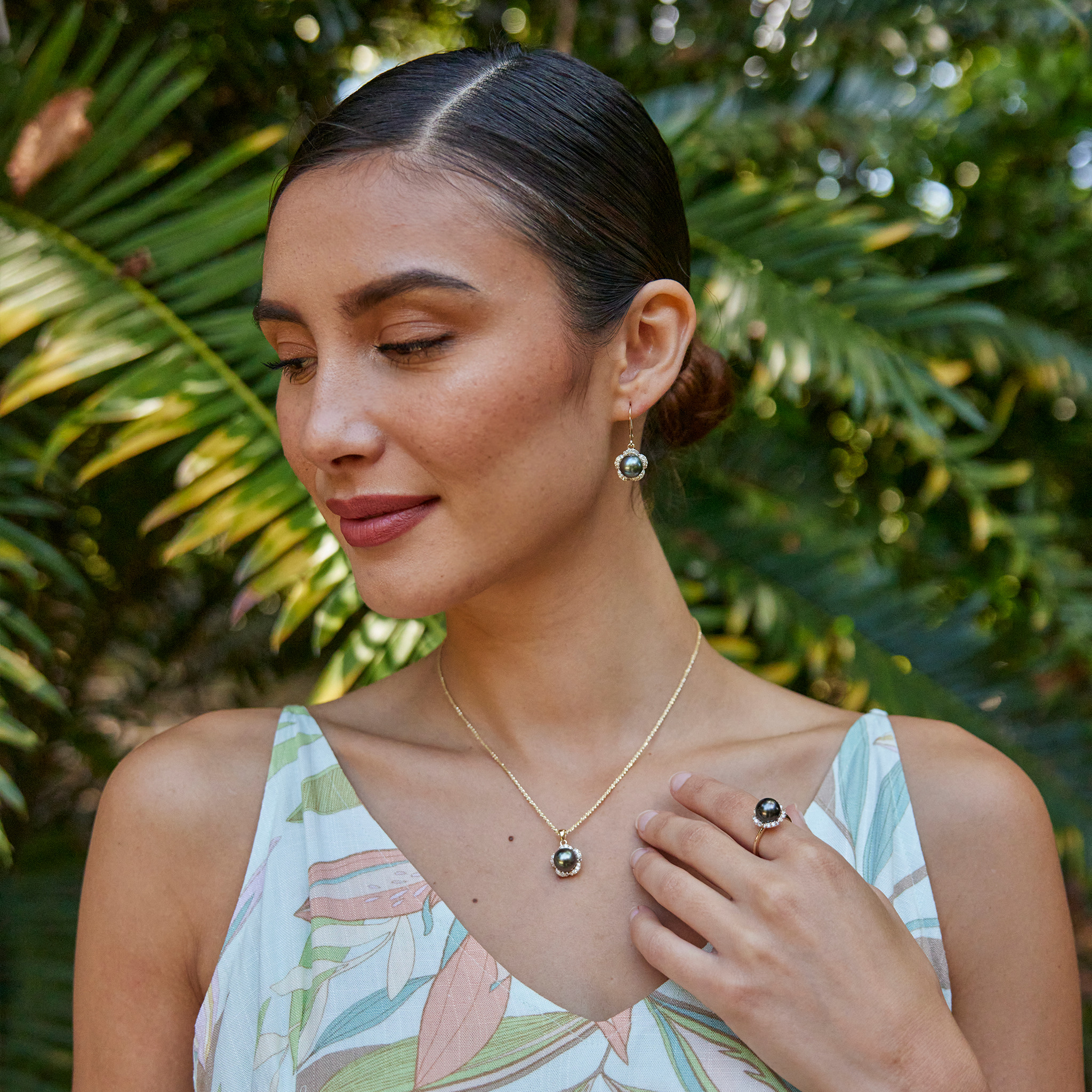 Model Wearing Plumeria Tahitian Black Pearl Pendant in Gold with Diamonds