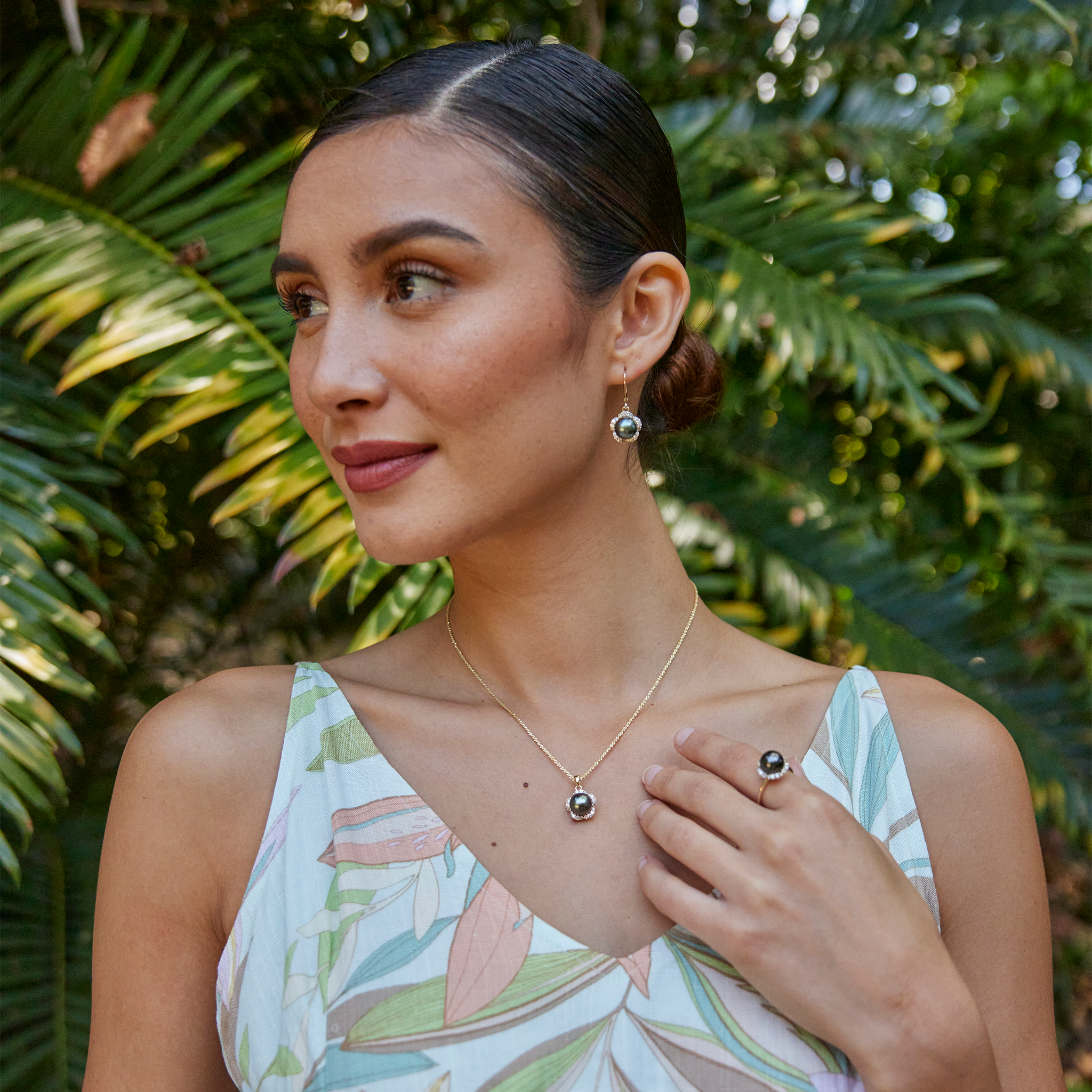 Model Wearing Plumeria Tahitian Black Pearl Pendant in Gold with Diamonds