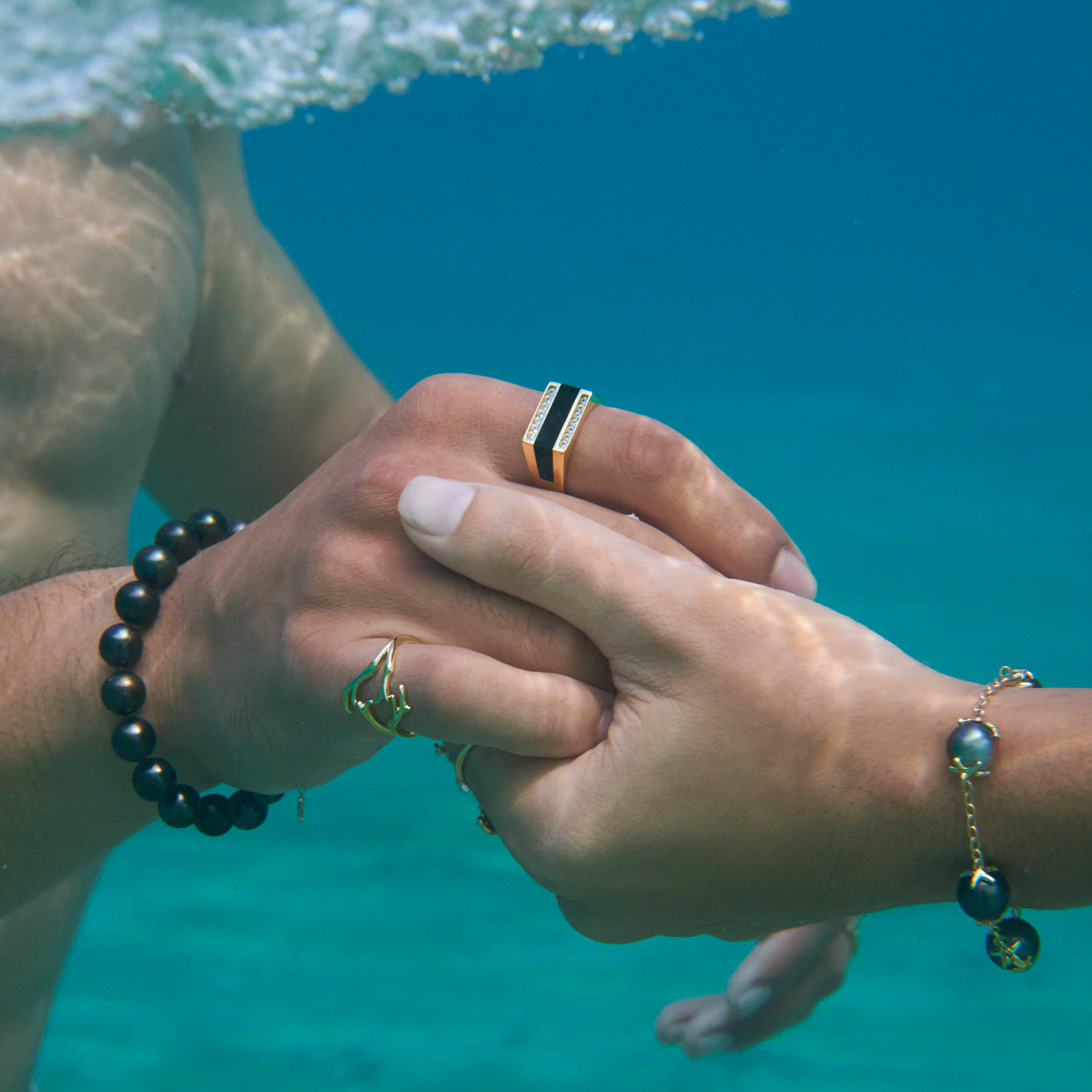 Black Coral Ring in Gold with Diamonds on Male Model underwater