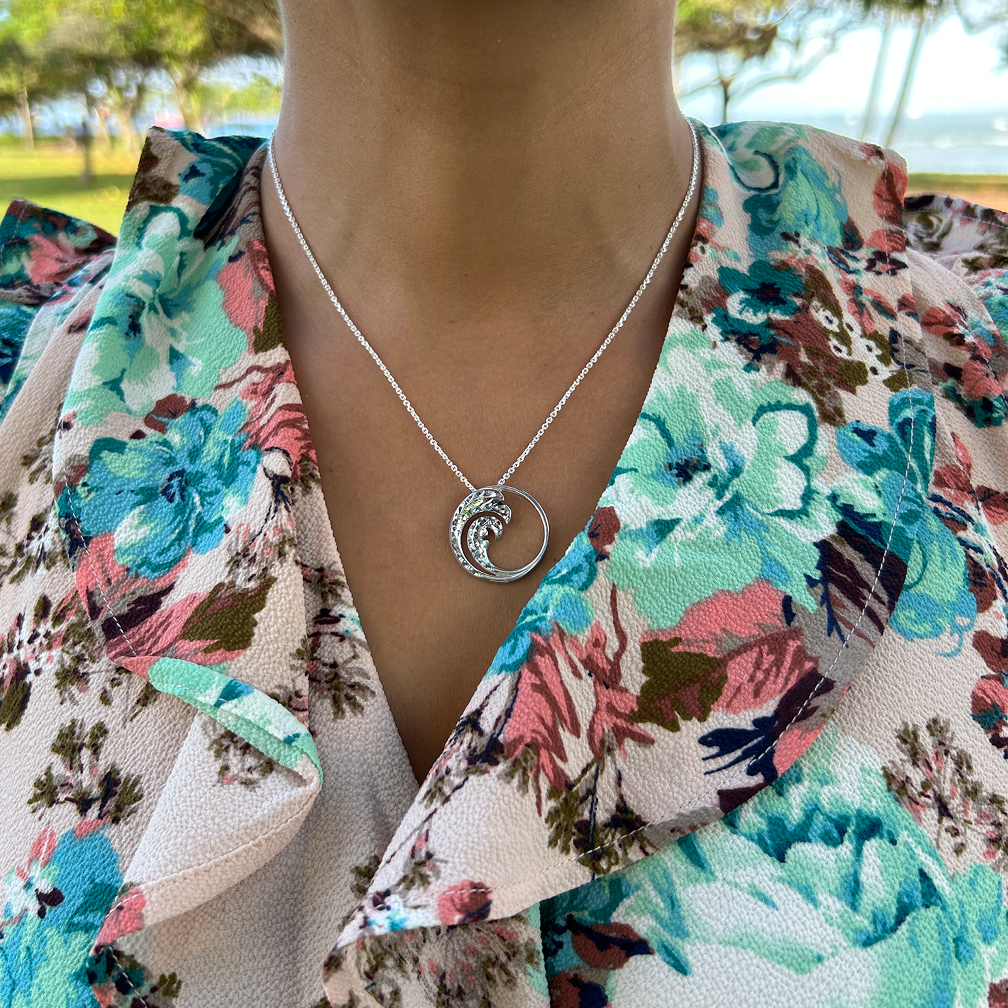 A woman wearing a 24" Adjustable Nalu Necklace in Sterling Silver - 24mm - Maui Divers Jewelry