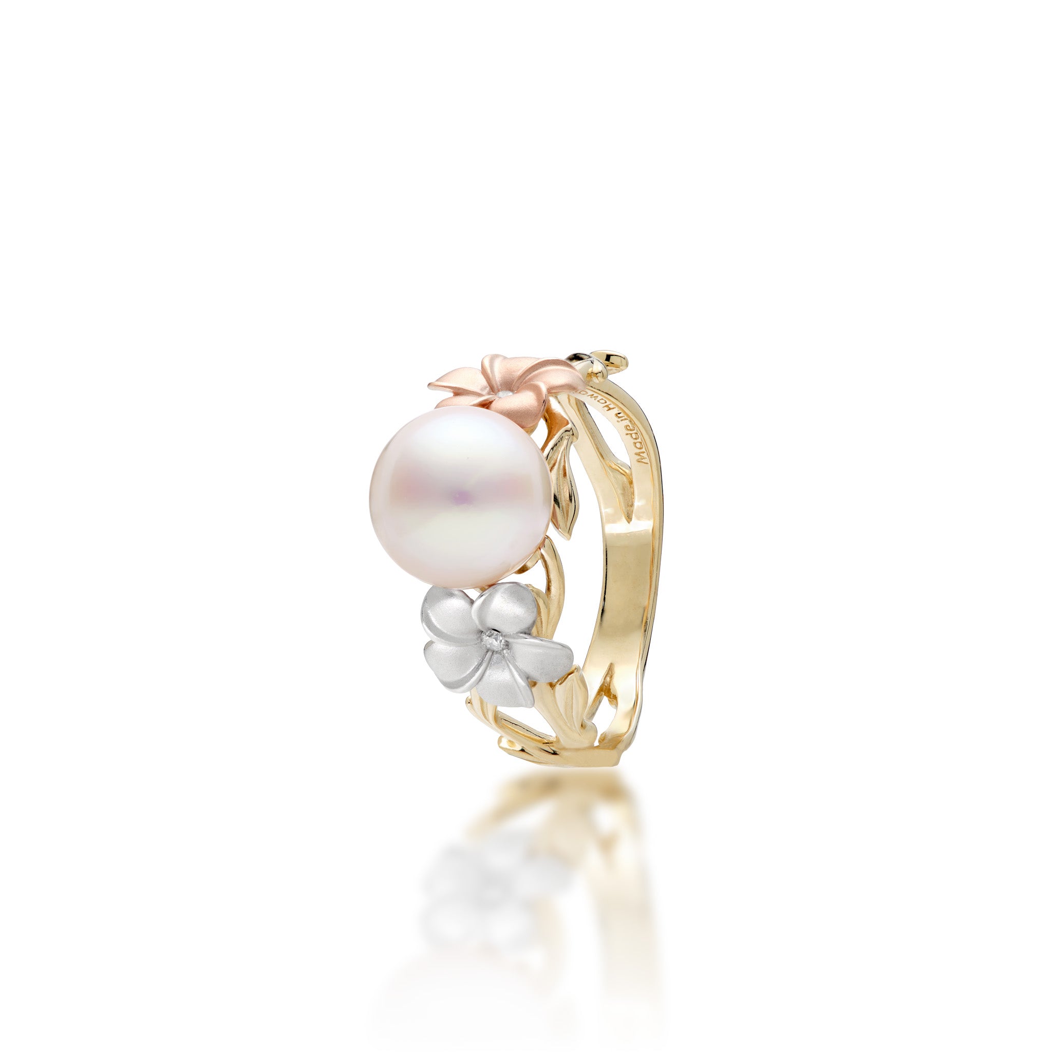Angle view of the Pearls in Bloom Plumeria 8mm Akoya White Pearl Ring in Tri Color Gold with Diamonds on a white background