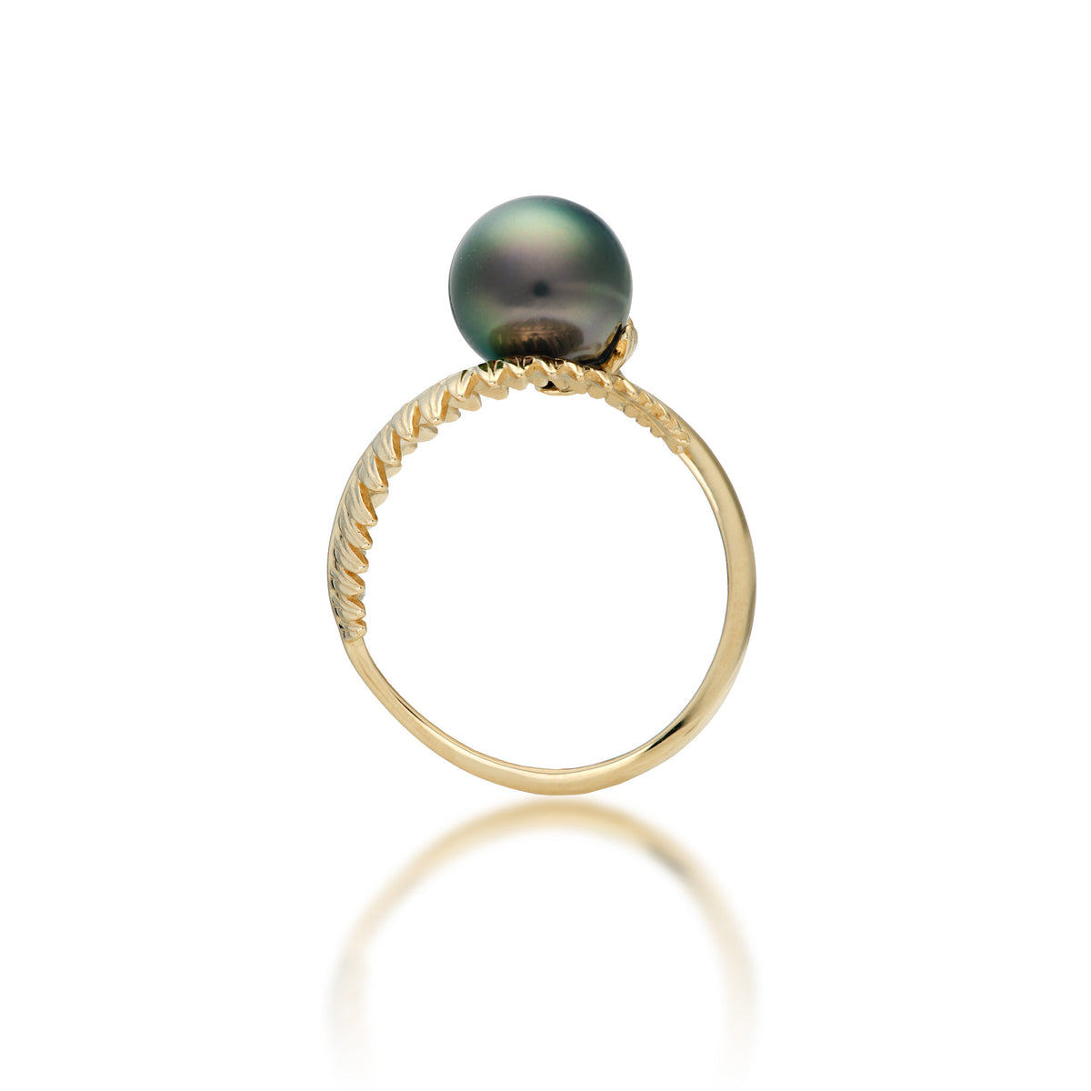 Side view of the Kupukupu Fern Tahitian Black Pearl Bypass Ring in 14k Yellow Gold on a white background