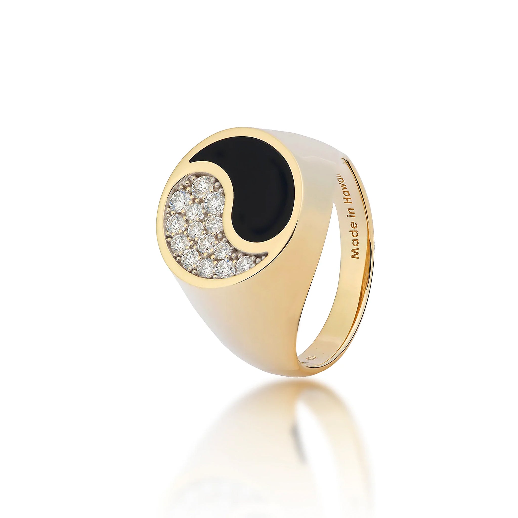 Tapered 17.5mm Yin Yang Collection Ring  in high-polish 14k yellow gold with Hawaiian black coral inlay and natural diamonds that create the yin yang design and a ʻMade in Hawaiiʻ inscription inside the band on a white background