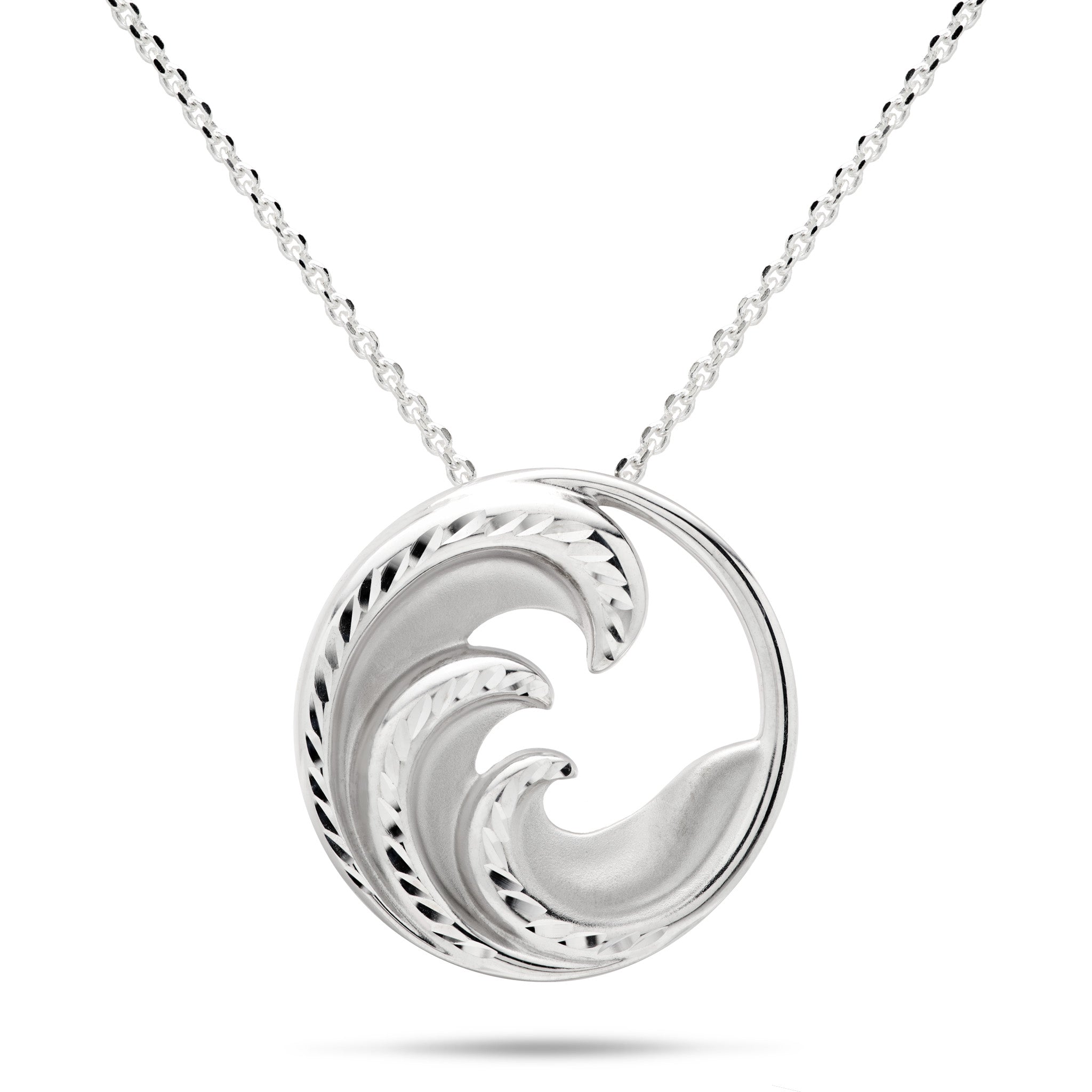 24mm Round Nalu Pendant in Sterling Silver with satin finish and contrasting diamond-cut waves on a cable chain against a white background