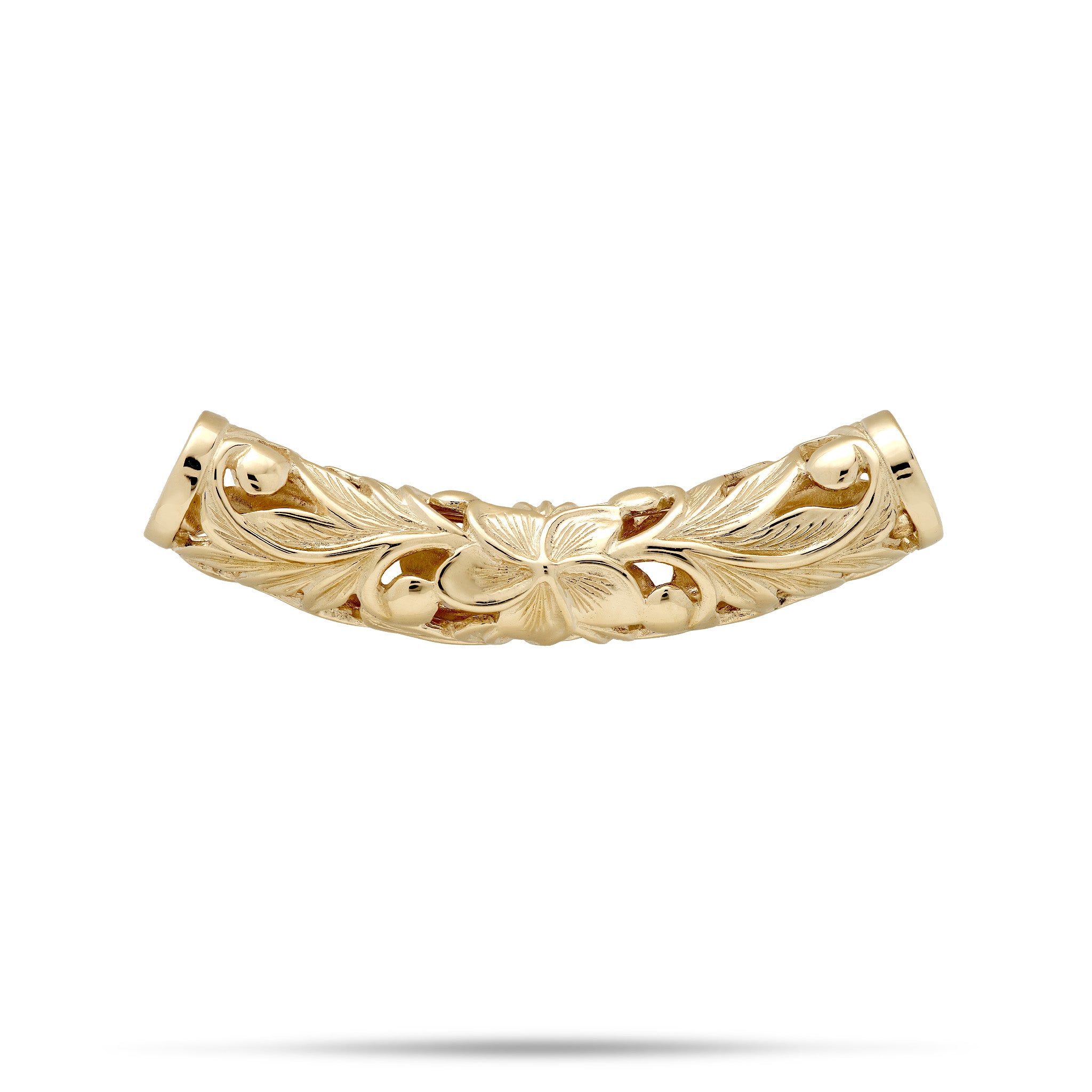 A curved 14k yellow gold Hawaiian Heirloom barrel pendant featuring maile leaf and fern scrollwork and a plumeria flower at the center, shown against a plain white background with a soft shadow underneath.