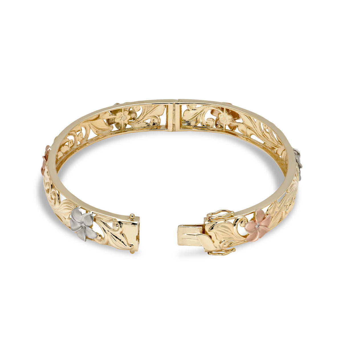 Detailed hinge shot of a 10mm Hawaiian Heirloom Bracelet in 14k yellow Gold with cut out design of rose and white gold plumeria flowers with diamond accented centers, maile leaves and hapuʻu fern; placed on a white background