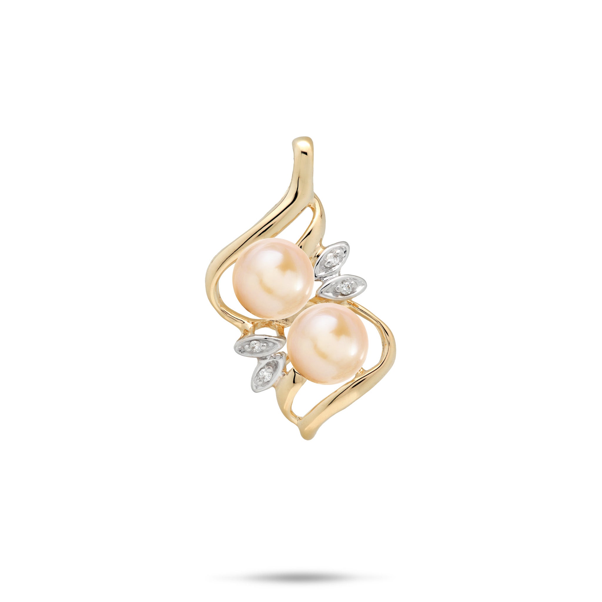 A 14k yellow gold pendant featuring two peach freshwater pearls and small clear diamonds in a maile leaf style setting, set against a plain white background
