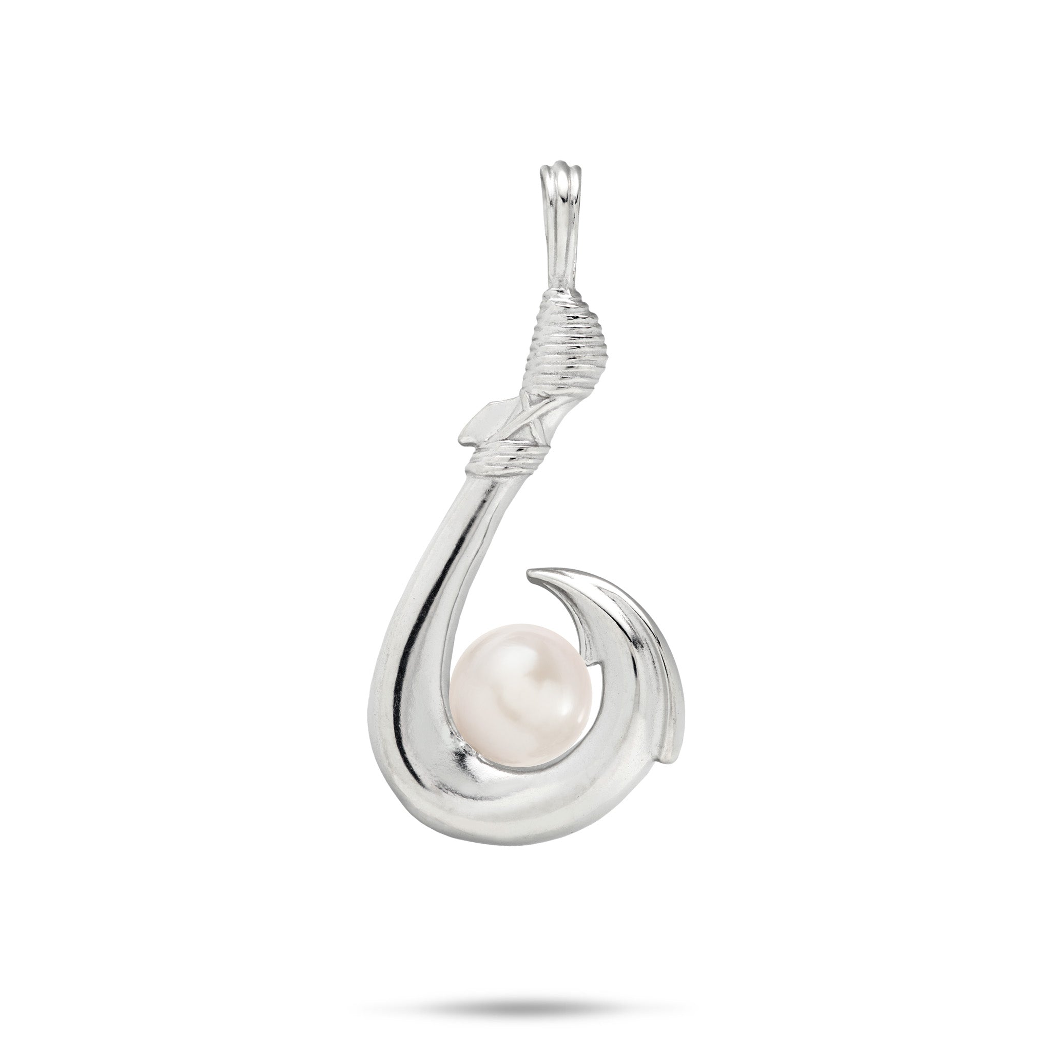 A silver fishhook pendant featuring a single white freshwater pearl nestled in the bottom curve of the hook, set against a plain white background