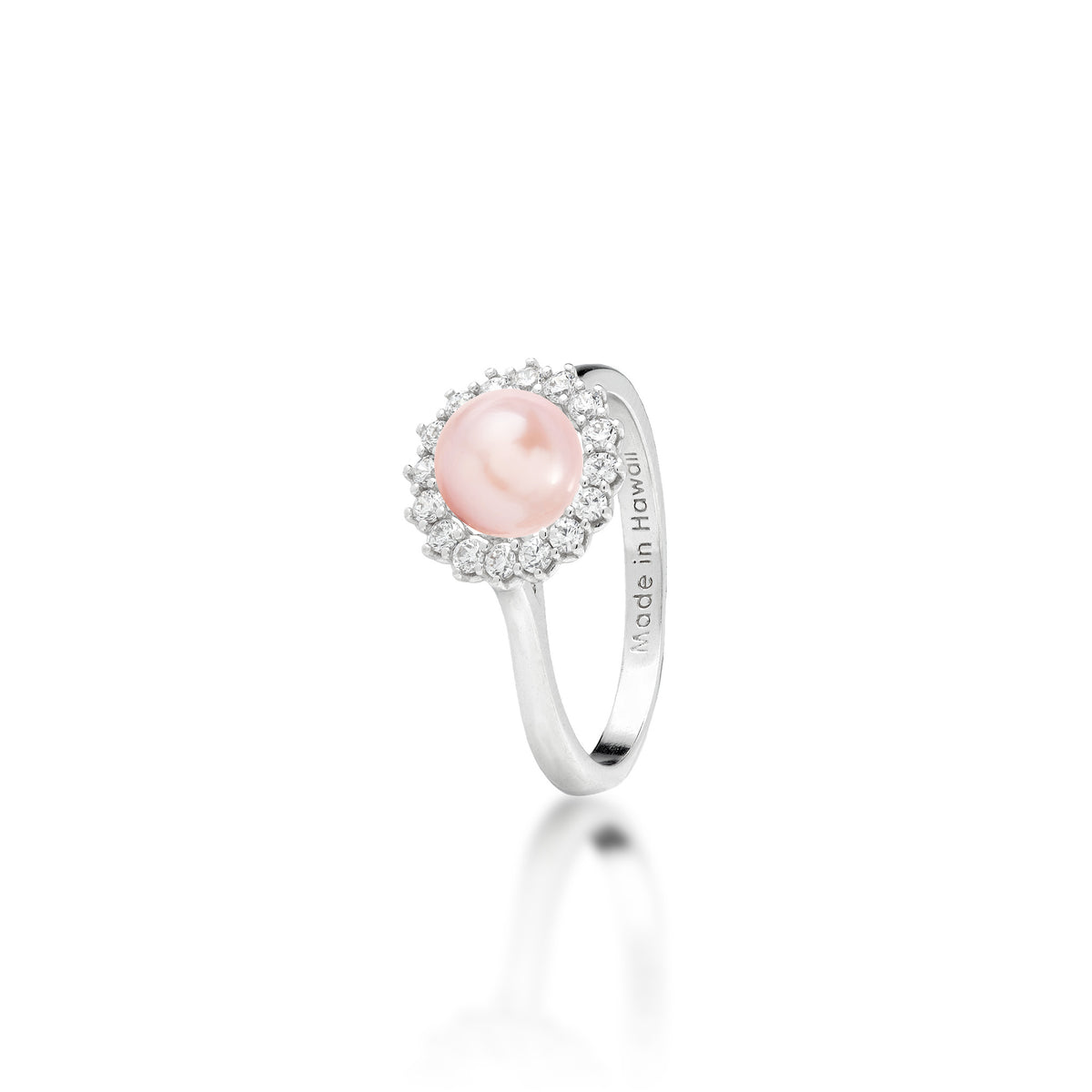 A sterling silver ring with a cubic zirconia halo and pink freshwater pearl at the center, shown on a white background