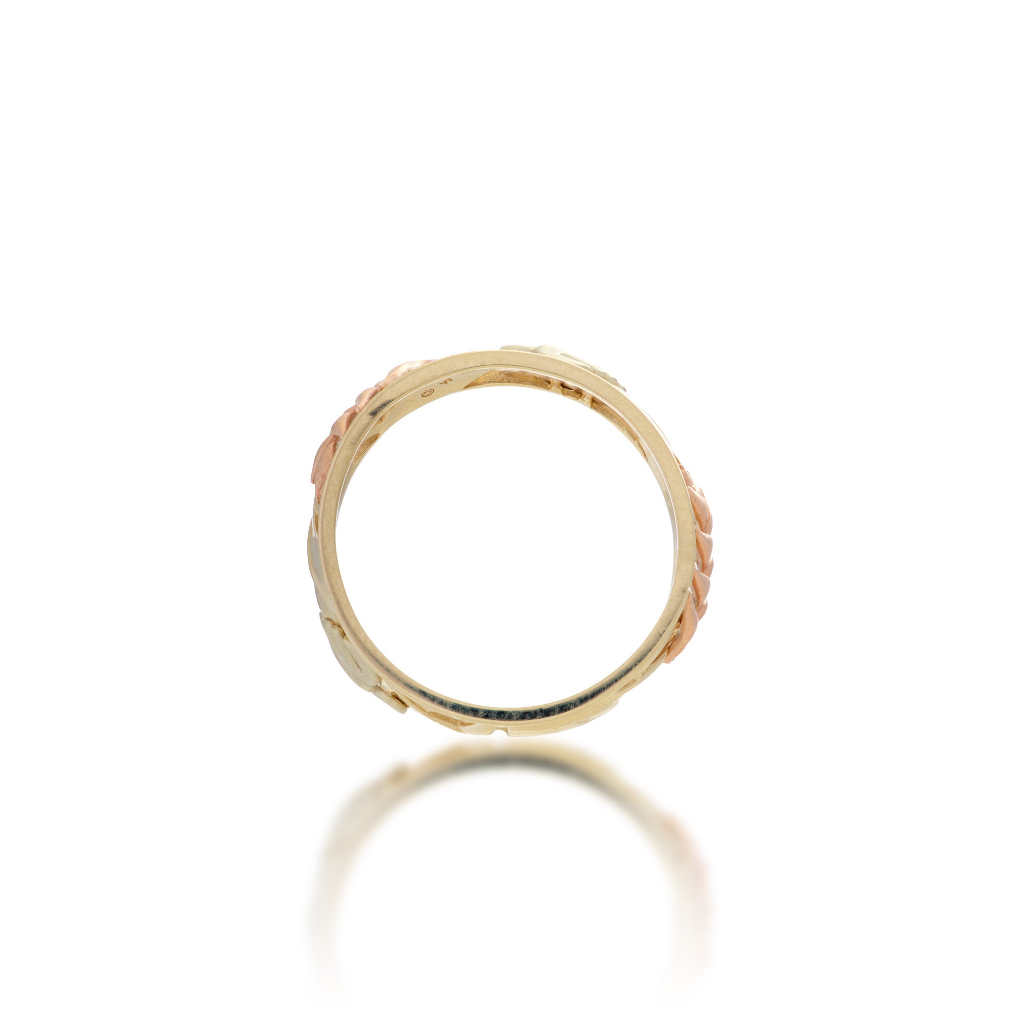 Side view of the 8mm Monstera & Heliconia Ring in 14k Yellow, Rose and Green Gold on a white background