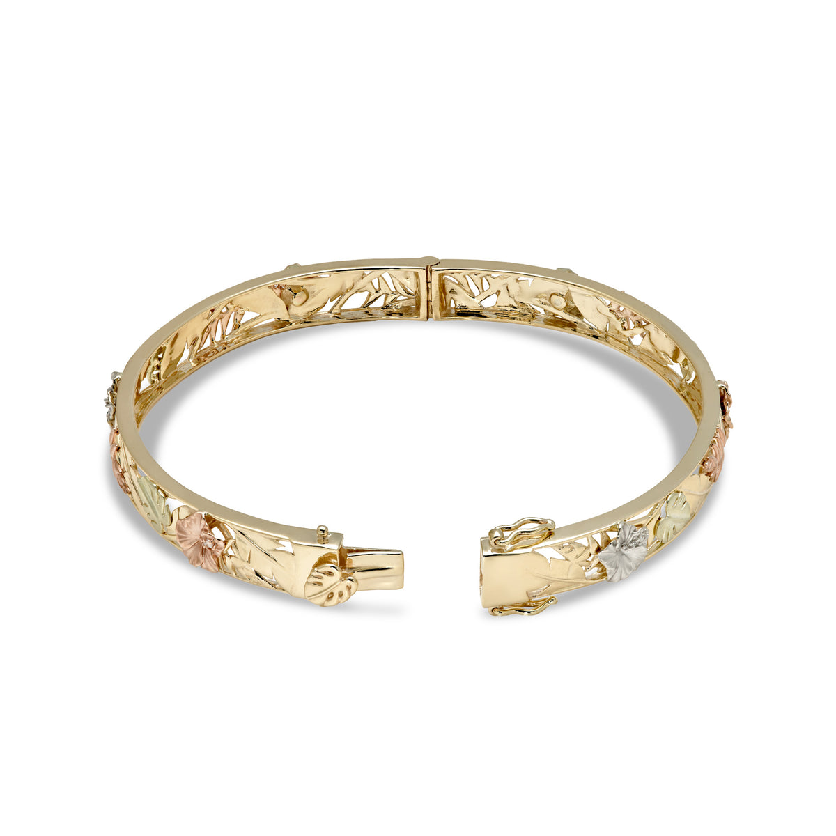 Open hinge detail on the Hawaiian Gardens Bracelet with banana leaves in 14k yellow gold, rose gold heliconia and hibiscus flowers, white gold hibiscus flowers, and green gold monstera leaves, hibiscus flowers have diamond detail; placed on a white background.