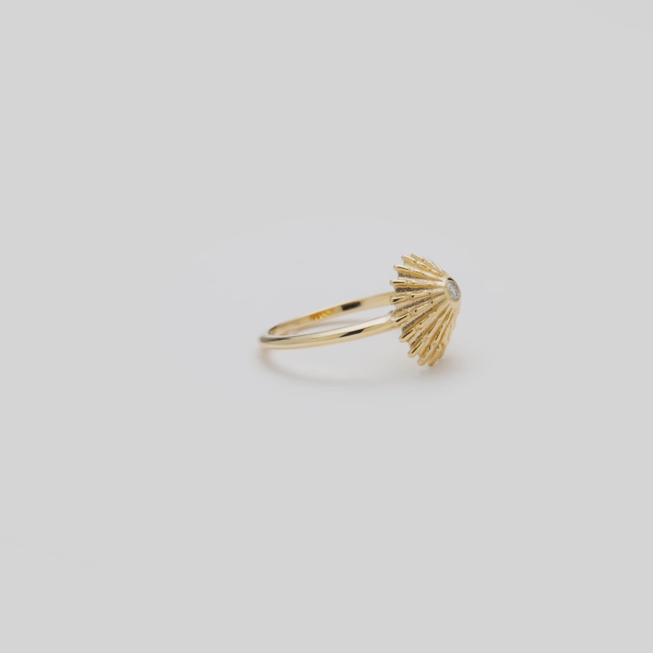 Video showcasing the ʻOpihi Ring in 14k Yellow Gold with Diamond on a turn table