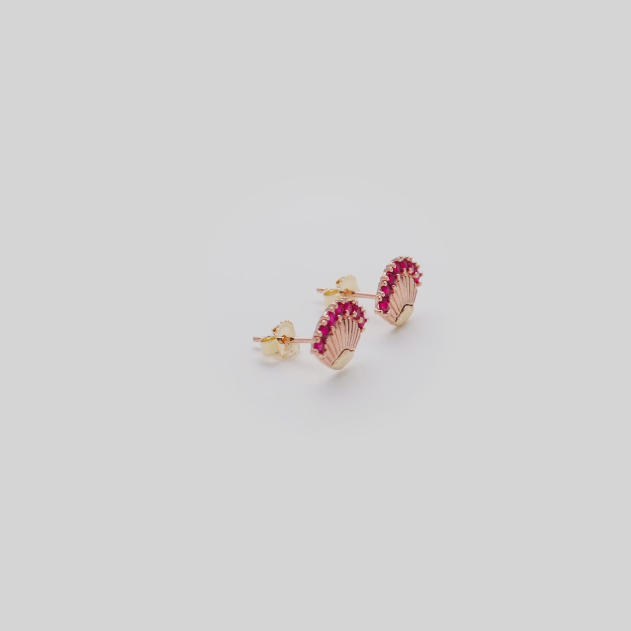 Video showcasing the 11mm ʻŌhiʻa Lehua Ruby Earrings in Two Tone Gold