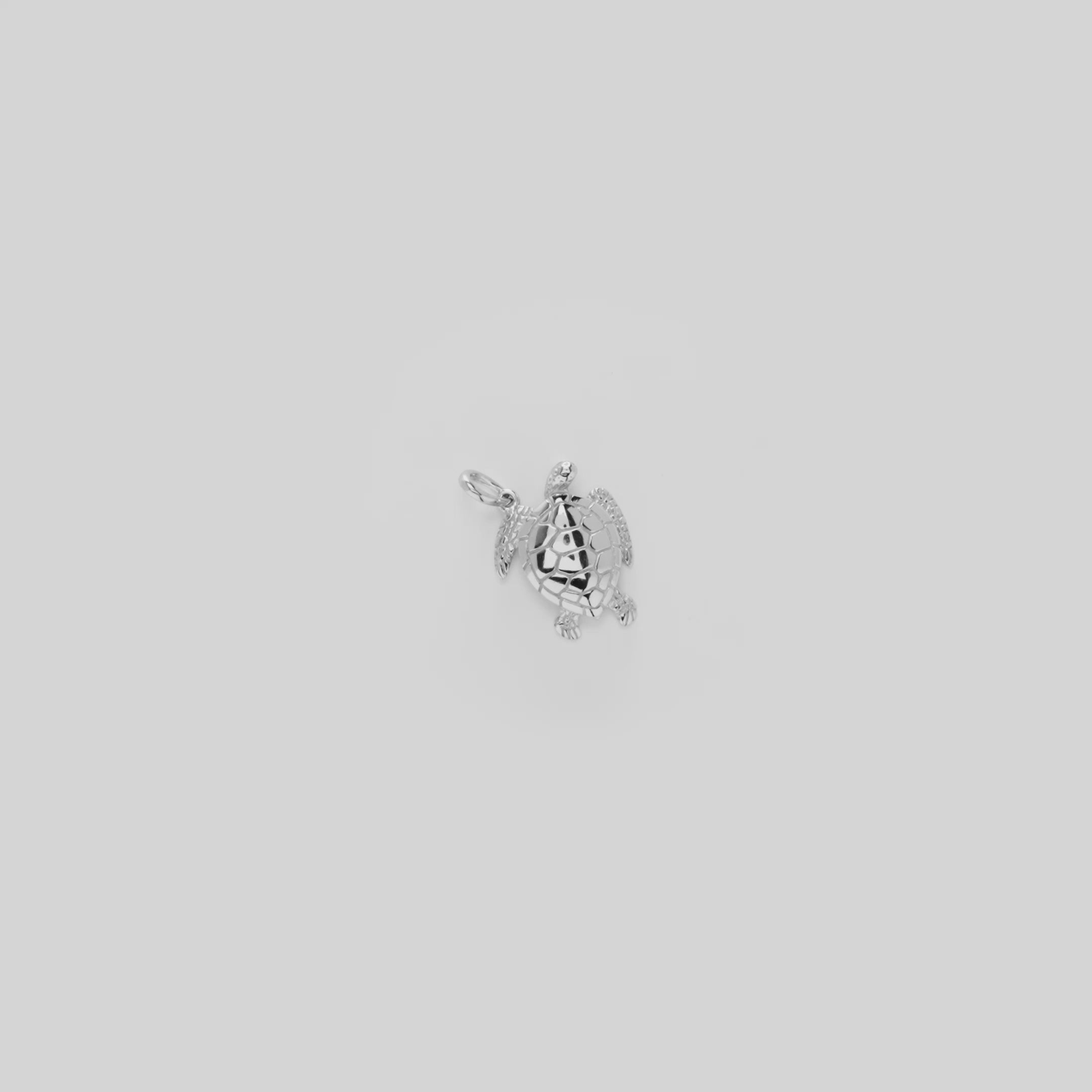 Video showcasing the 18mm Honu Pendant / Charm in Sterling Silver 
