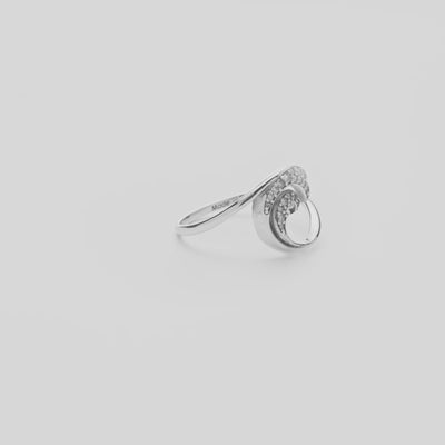 12mm Nalu Ring in White Gold with Diamonds on a white turntable