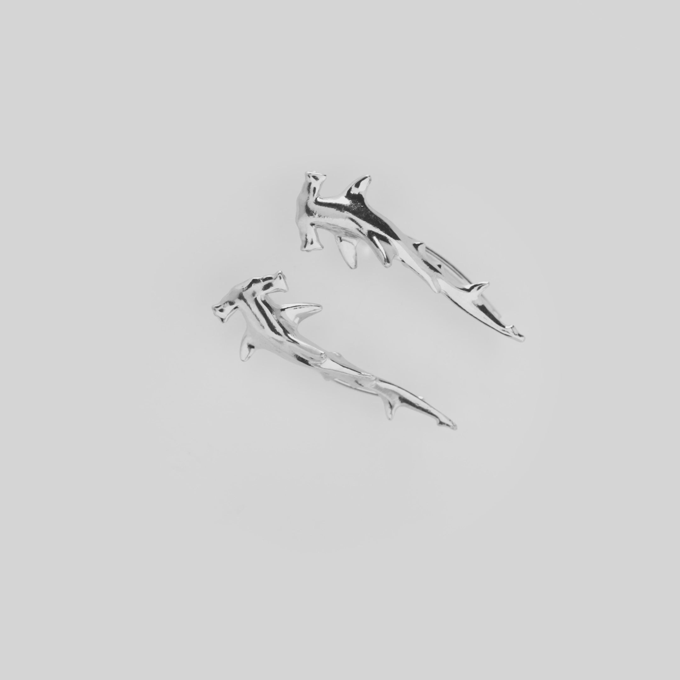 Video showcasing the Hammerhead Shark Climber Earrings in Sterling Silver on a turn table