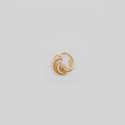 Video showcasing the 18mm Triple Wave Nalu Pendant in 14k Yellow Gold with Diamonds on a turn table